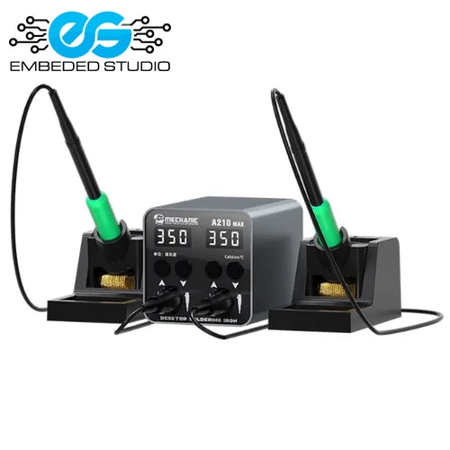 A grey MC A210 Max double iron soldering station with digital temperature displays showing 350, positioned between two soldering iron stands with green-accented handles on a white background, featuring the Embeded Studio logo