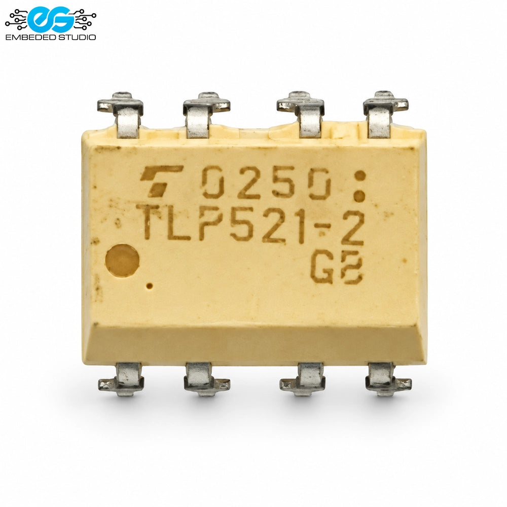 Toshiba TLP521-2 dual-channel photocoupler integrated circuit in an 8-pin dual in-line DIP package showing top surface markings and pinout alignment notch.