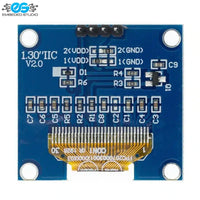 Top-down view of a monochrome OLED display module, showing the blue PCB, four-pin header connection, and component layout on the board.