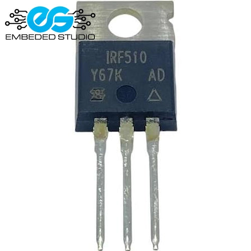 An IRF510 Y67K AD power transistor in a TO-220 package, featuring a dark blue body with white printed text and three metal leads, shown on a white background with an Embedded Studio watermark.