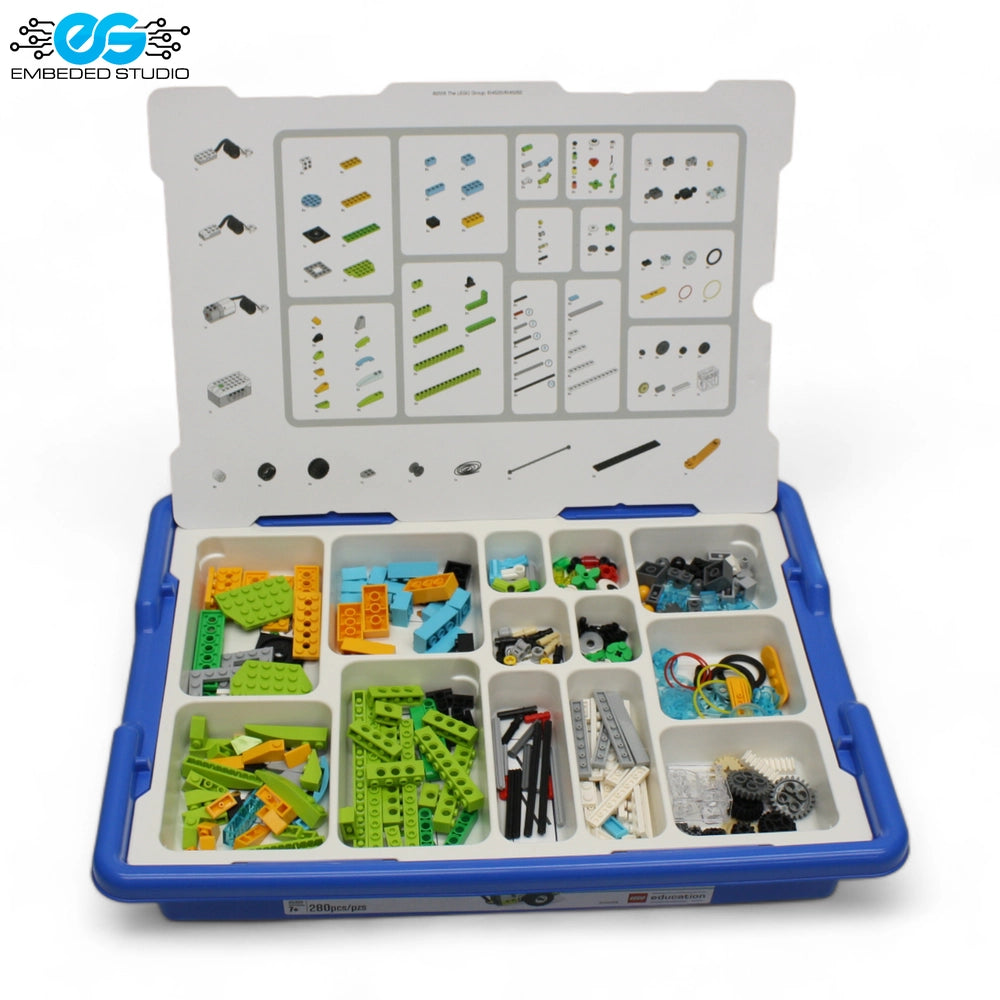 LEGO WeDo 2.0 Core Set elements including the sorting tray with organized Lego pieces, building element chart on the lid, and the Embeded Studio logo