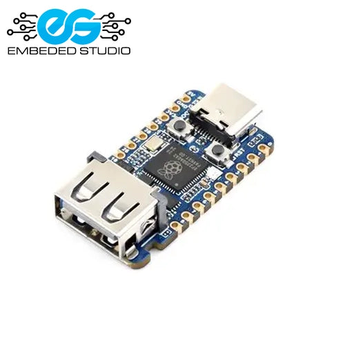 RP2350 USB mini development board with an integrated USB-A plug, USB-C port, and boot/reset buttons on a blue PCB, featuring the Embeded Studio logo.