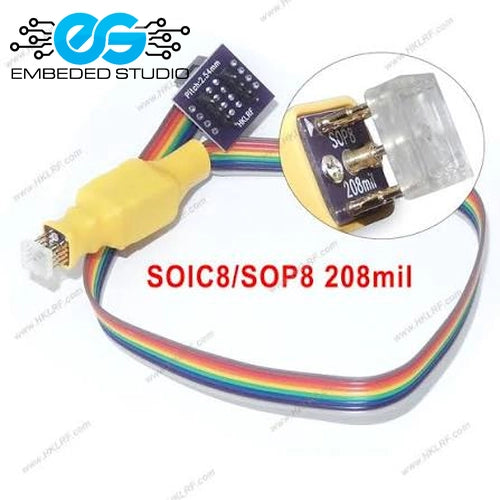 An industrial ribbon cable adapter with a yellow male connector, a 20-pin dual-in-line IC package, and a rainbow-colored cable, shown with an inset circle highlighting the 208mil SOIC8/SOP8 package. The brand 'Embedded Studio' is visible as a watermark logo in the top left.